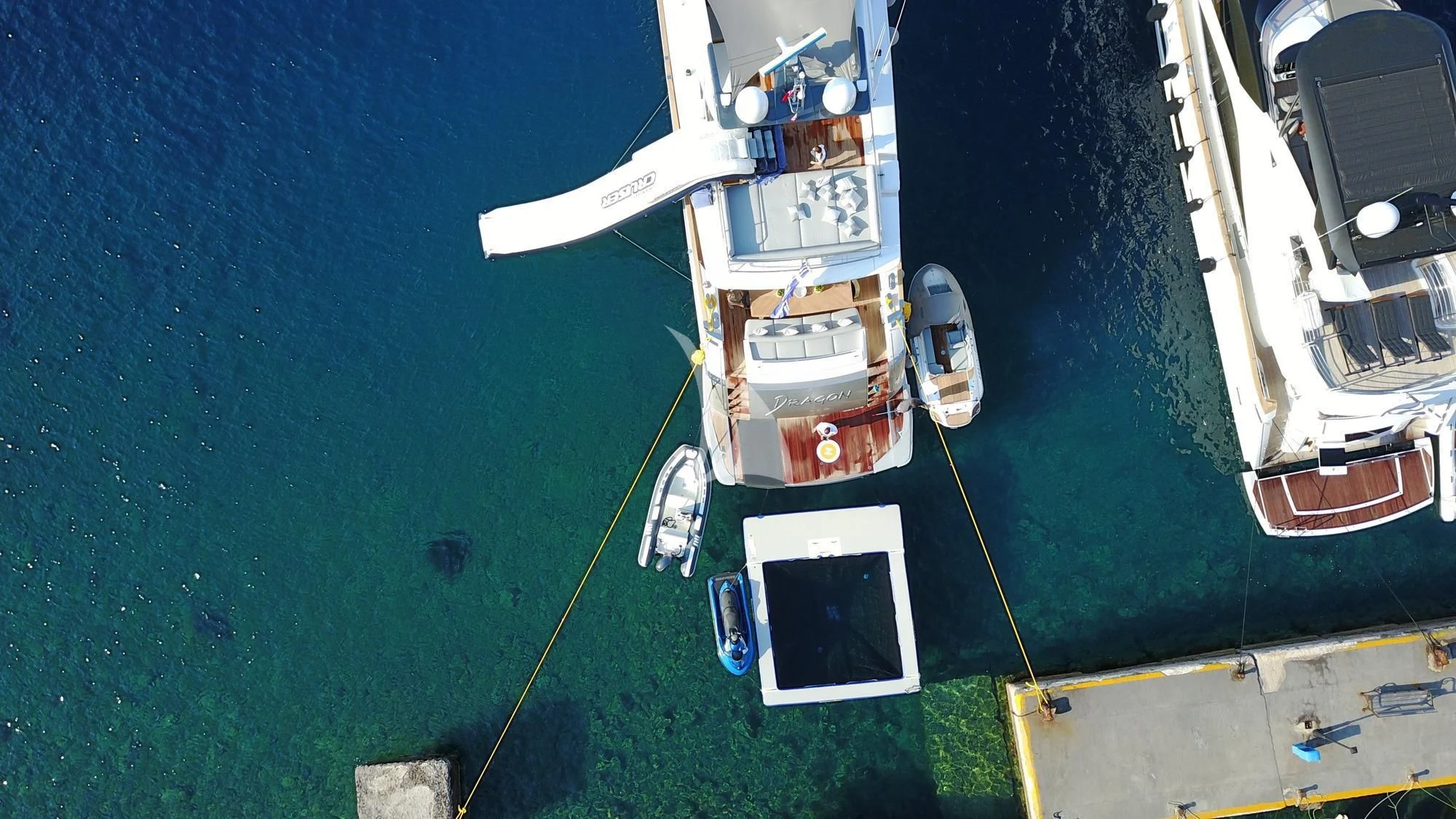 a satellite over a body of water aboard DRAGON Yacht for Sale
