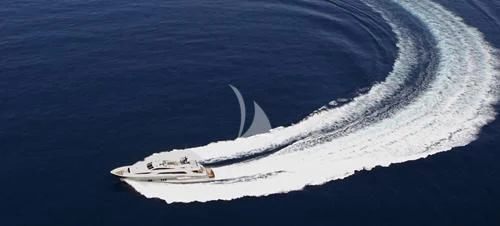 a white ship in the water aboard DRAGON Yacht for Sale