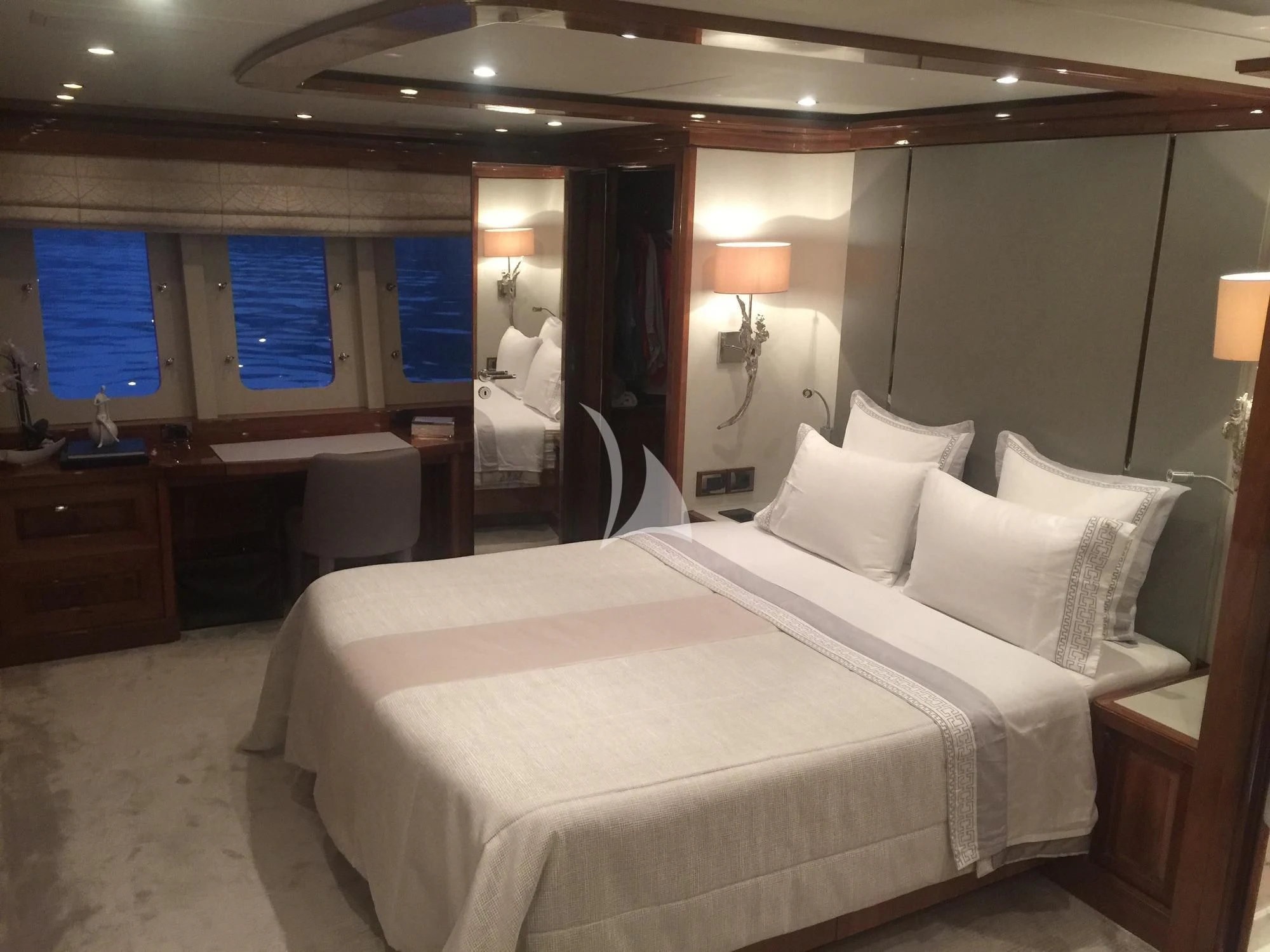 a hotel room with a bed aboard DRAGON Yacht for Sale