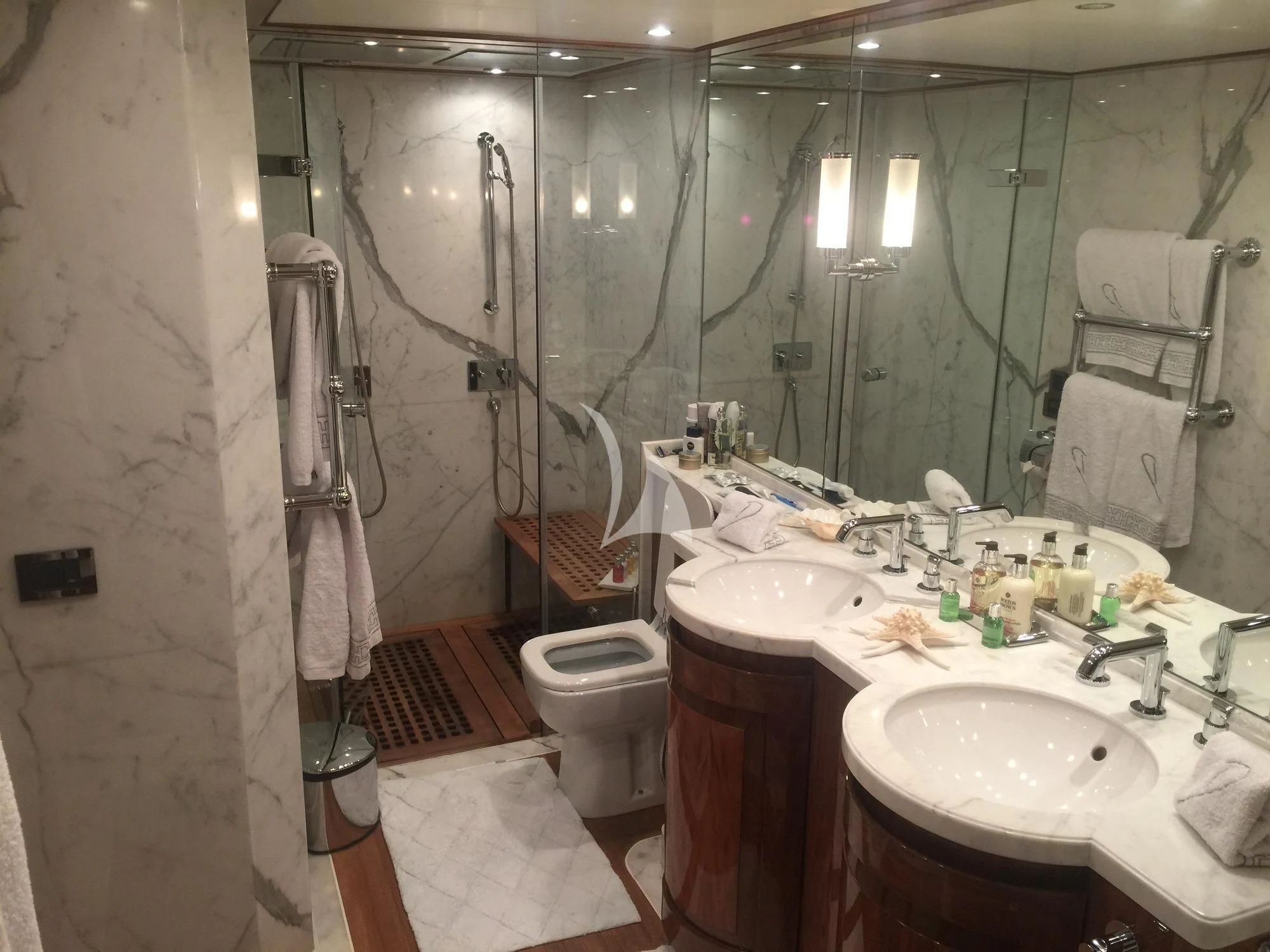 a bathroom with a sink and a toilet aboard DRAGON Yacht for Sale