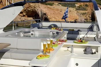 a kitchen with a large rock wall aboard DRAGON Yacht for Sale