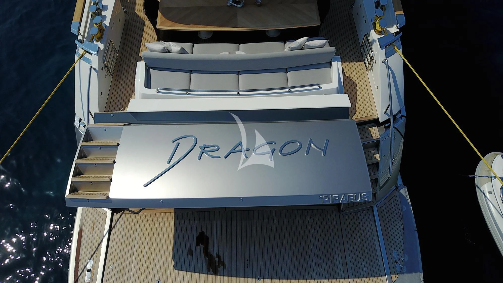 a boat with a sign on it aboard DRAGON Yacht for Sale