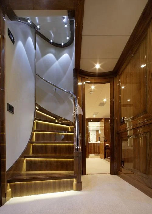 a staircase in a building aboard DRAGON Yacht for Sale