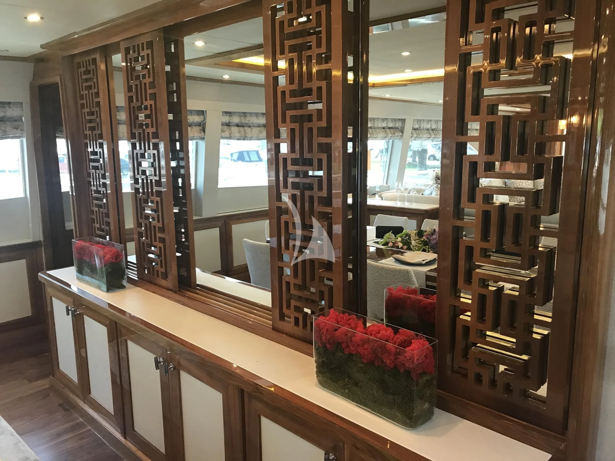 a room with a table and chairs aboard DRAGON Yacht for Sale