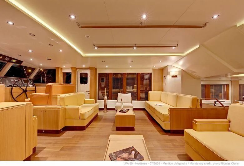 a large living room with a large open floor plan aboard HORTENSE Yacht for Sale