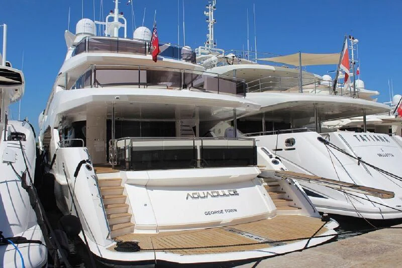 a boat docked at a pier aboard AGUADULCE Yacht for Sale
