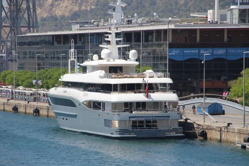 a large white boat in a body of water aboard CONSTANCE Yacht for Sale