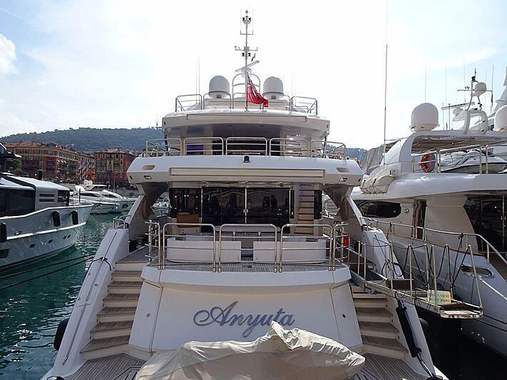 a large white boat docked aboard ANYUTA Yacht for Sale