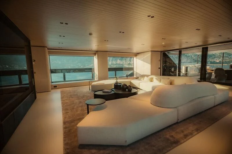 a living room with a large window aboard VIRTUOSITY Yacht for Sale