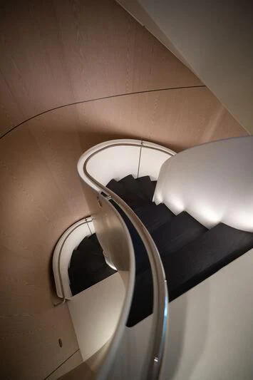 a white fan on a ceiling aboard VIRTUOSITY Yacht for Sale