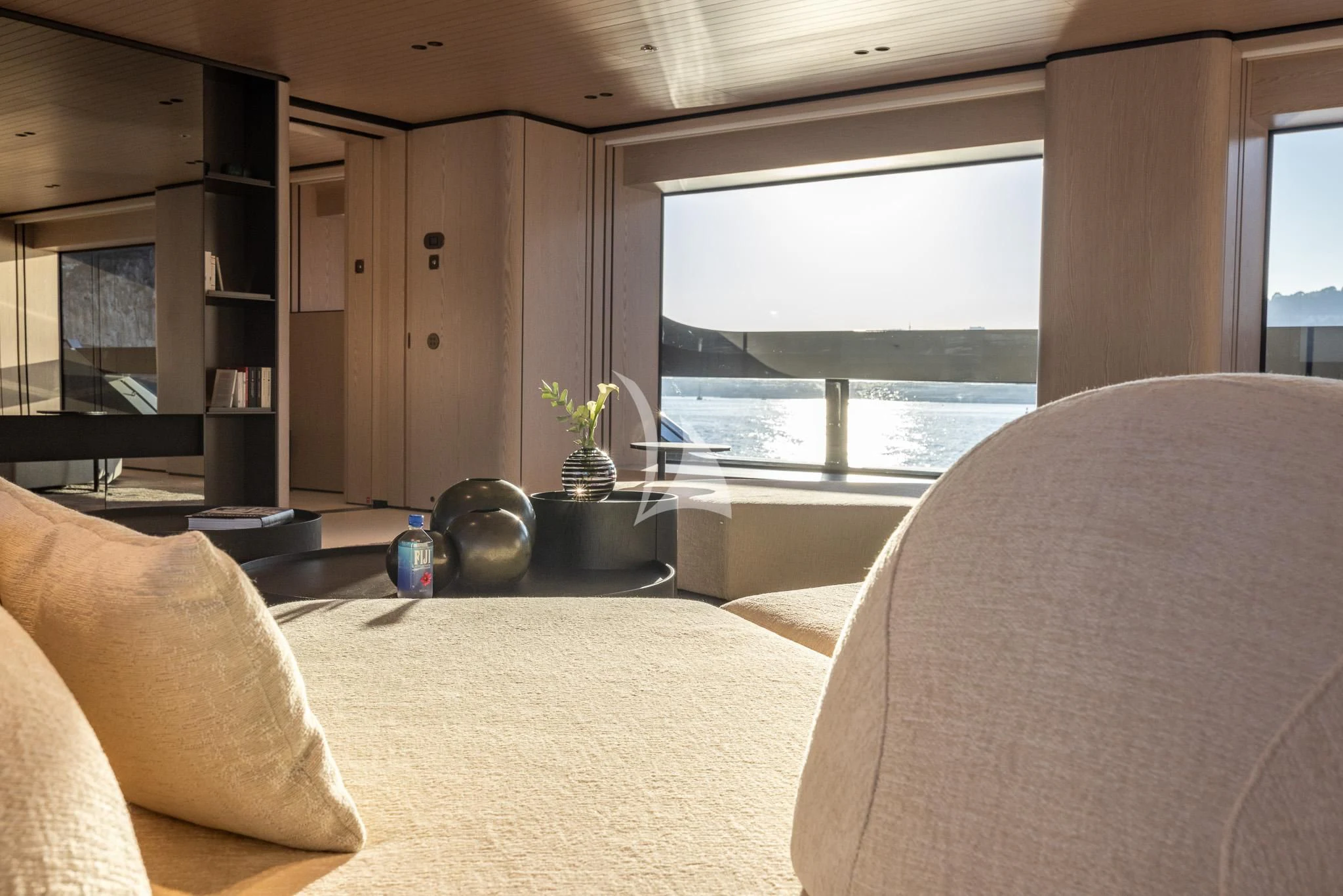 a living room with a large window aboard VIRTUOSITY Yacht for Sale