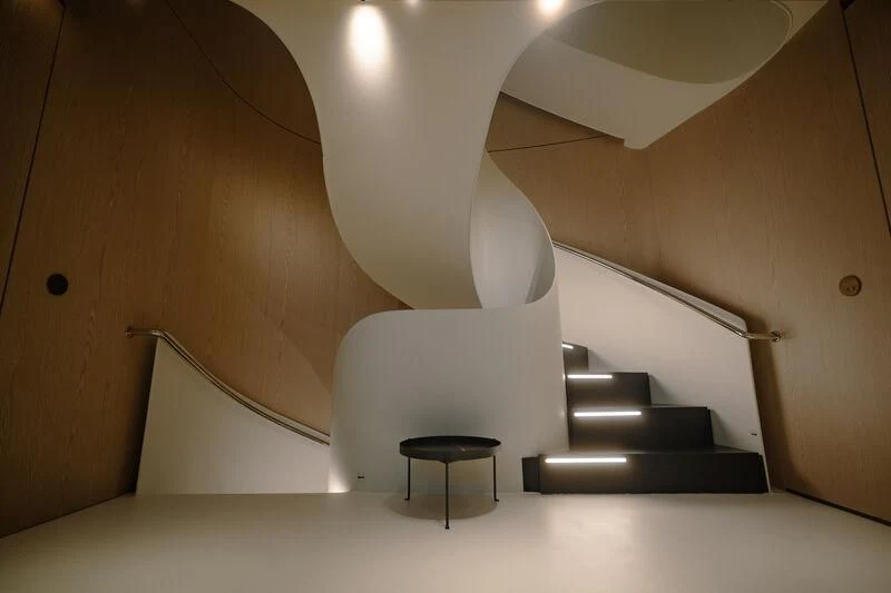 a staircase with a white ceiling aboard VIRTUOSITY Yacht for Sale