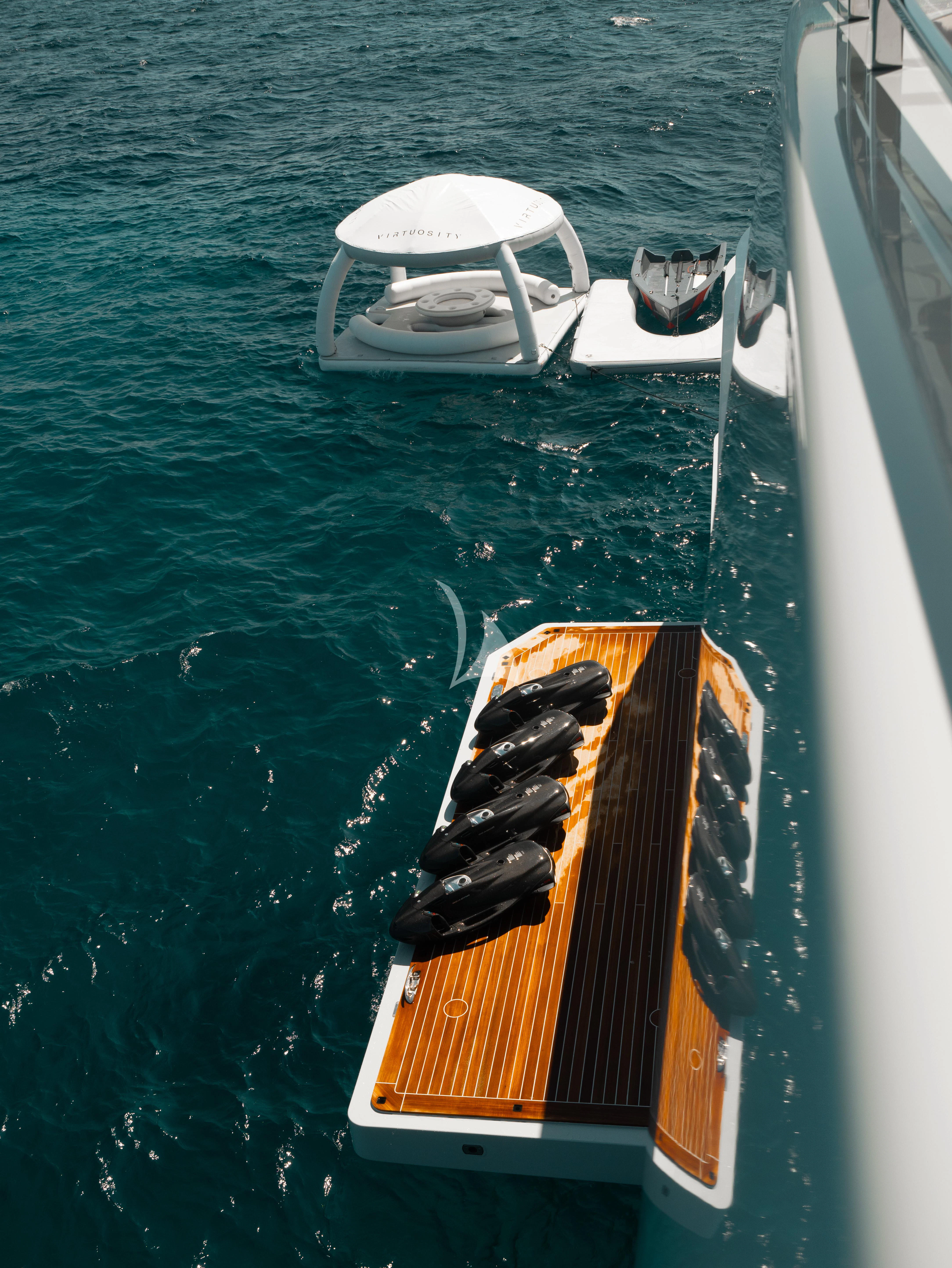 a boat with a rope attached to it aboard VIRTUOSITY Yacht for Sale