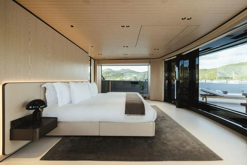 a bed in a room aboard VIRTUOSITY Yacht for Sale