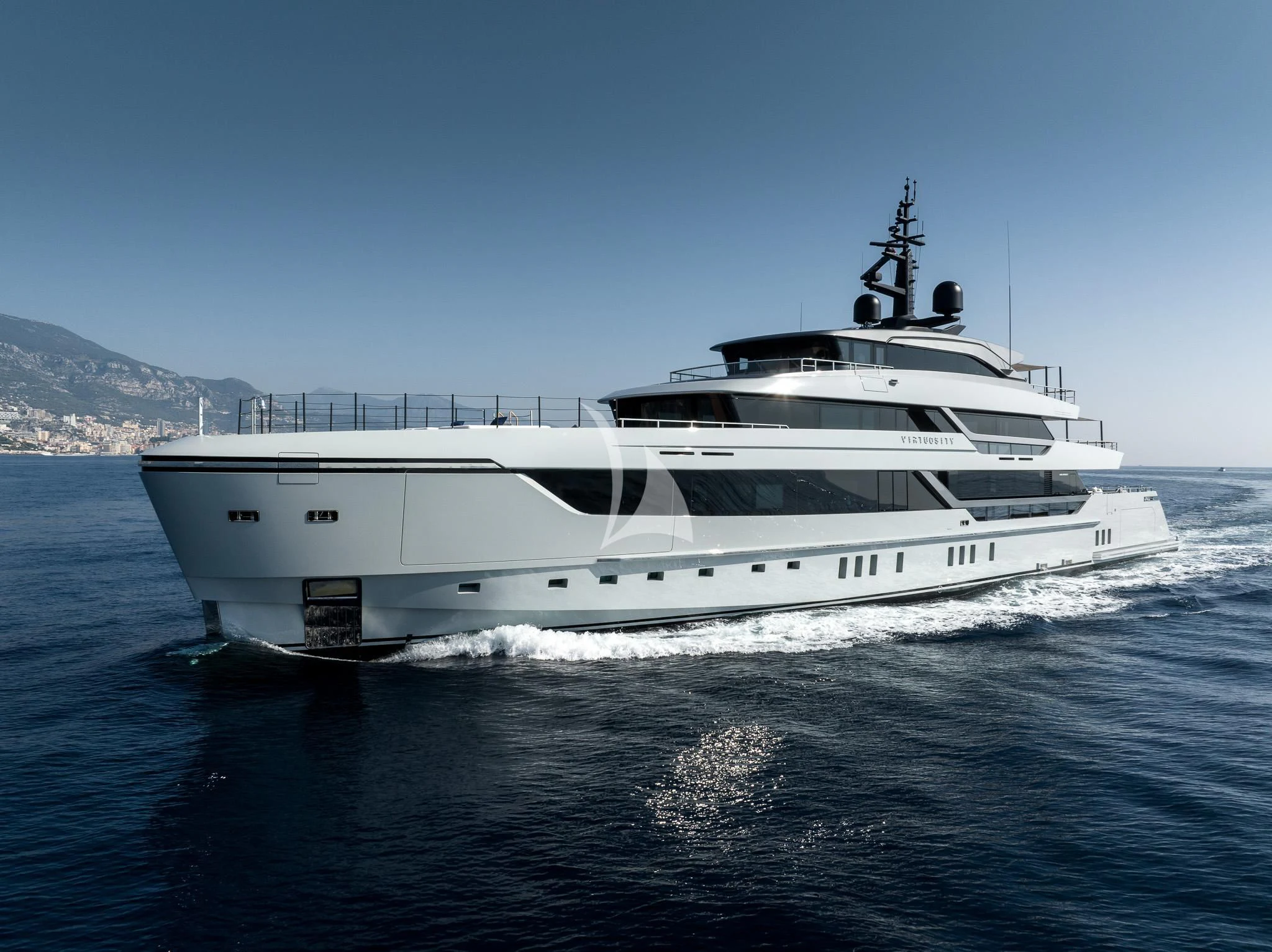 a white yacht in the water aboard VIRTUOSITY Yacht for Sale