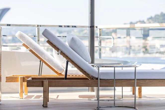 a white bird on a railing aboard VIRTUOSITY Yacht for Sale