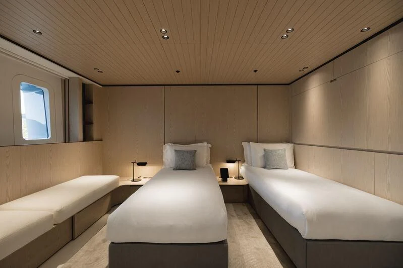 a room with two beds aboard VIRTUOSITY Yacht for Sale
