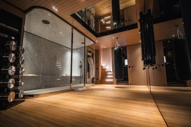 a large room with a large mirror aboard VIRTUOSITY Yacht for Sale