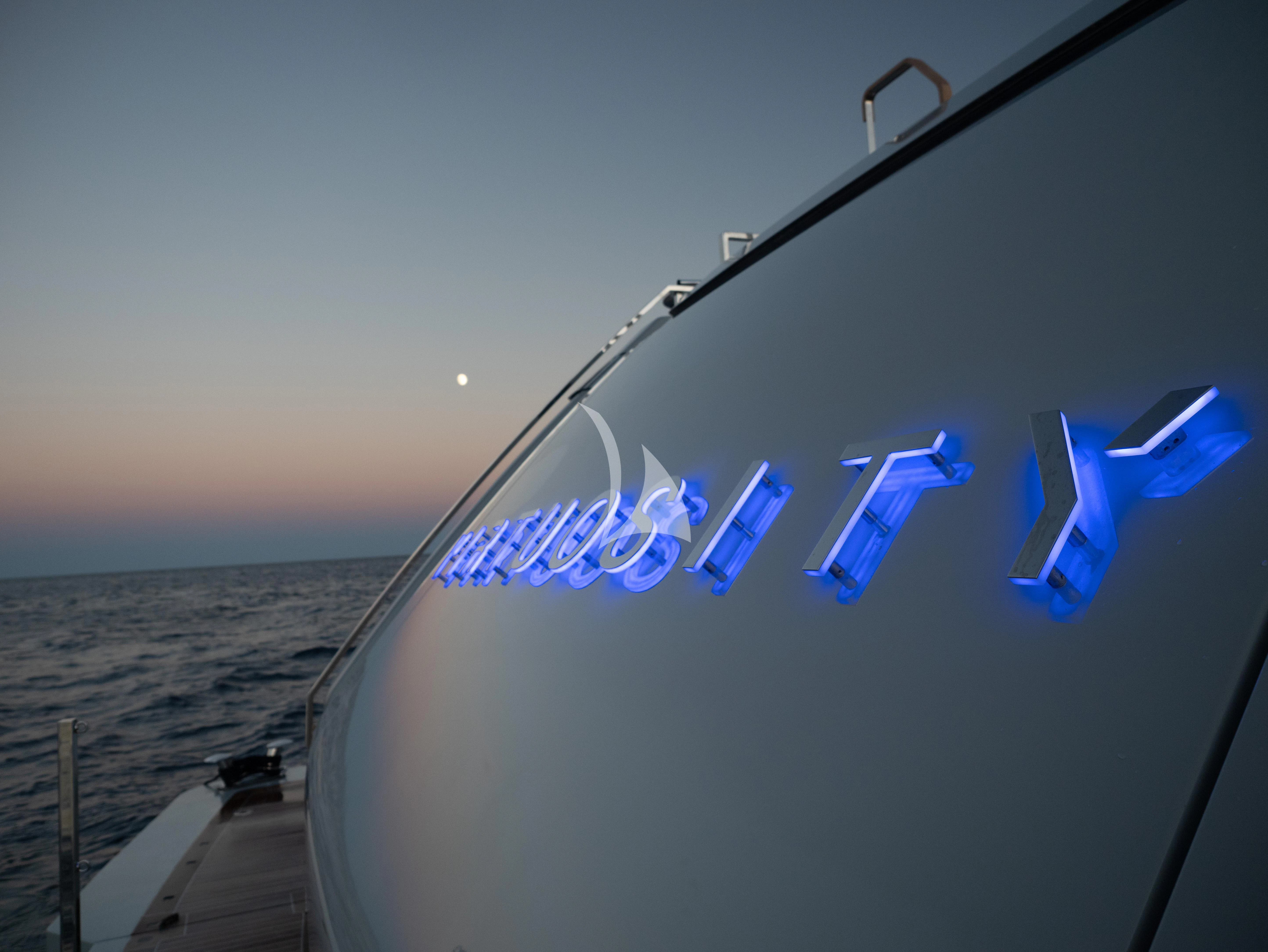 a window with blue text aboard VIRTUOSITY Yacht for Sale