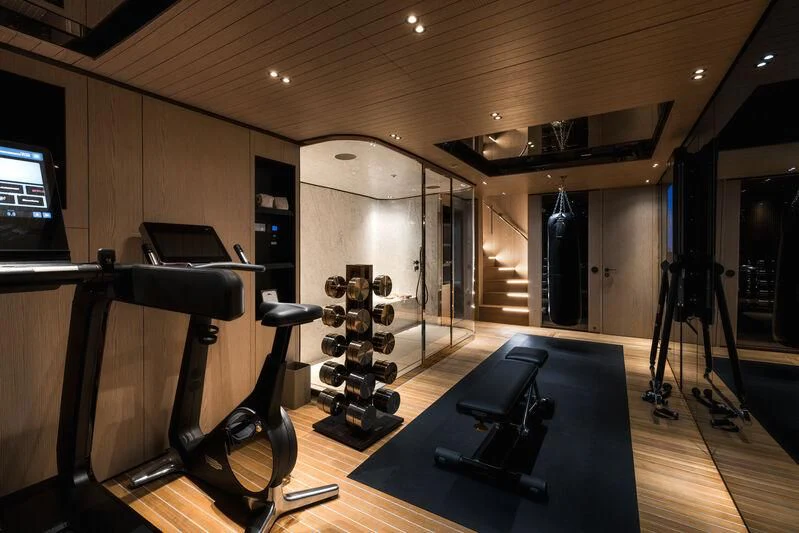 a gym with exercise equipment aboard VIRTUOSITY Yacht for Sale