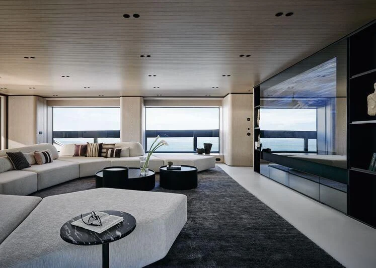 a living room with a large window aboard VIRTUOSITY Yacht for Sale