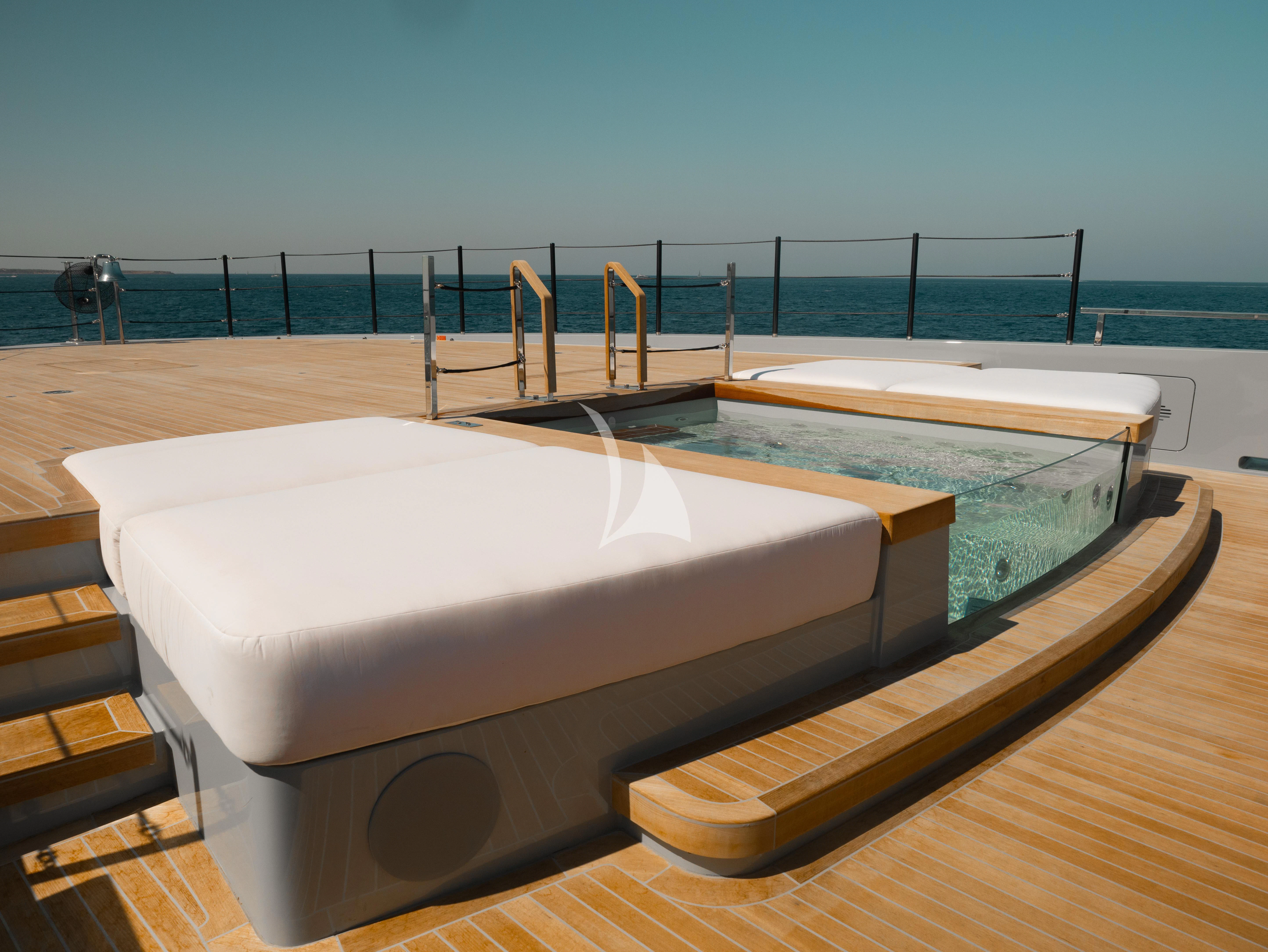 a pool table on a deck aboard VIRTUOSITY Yacht for Sale