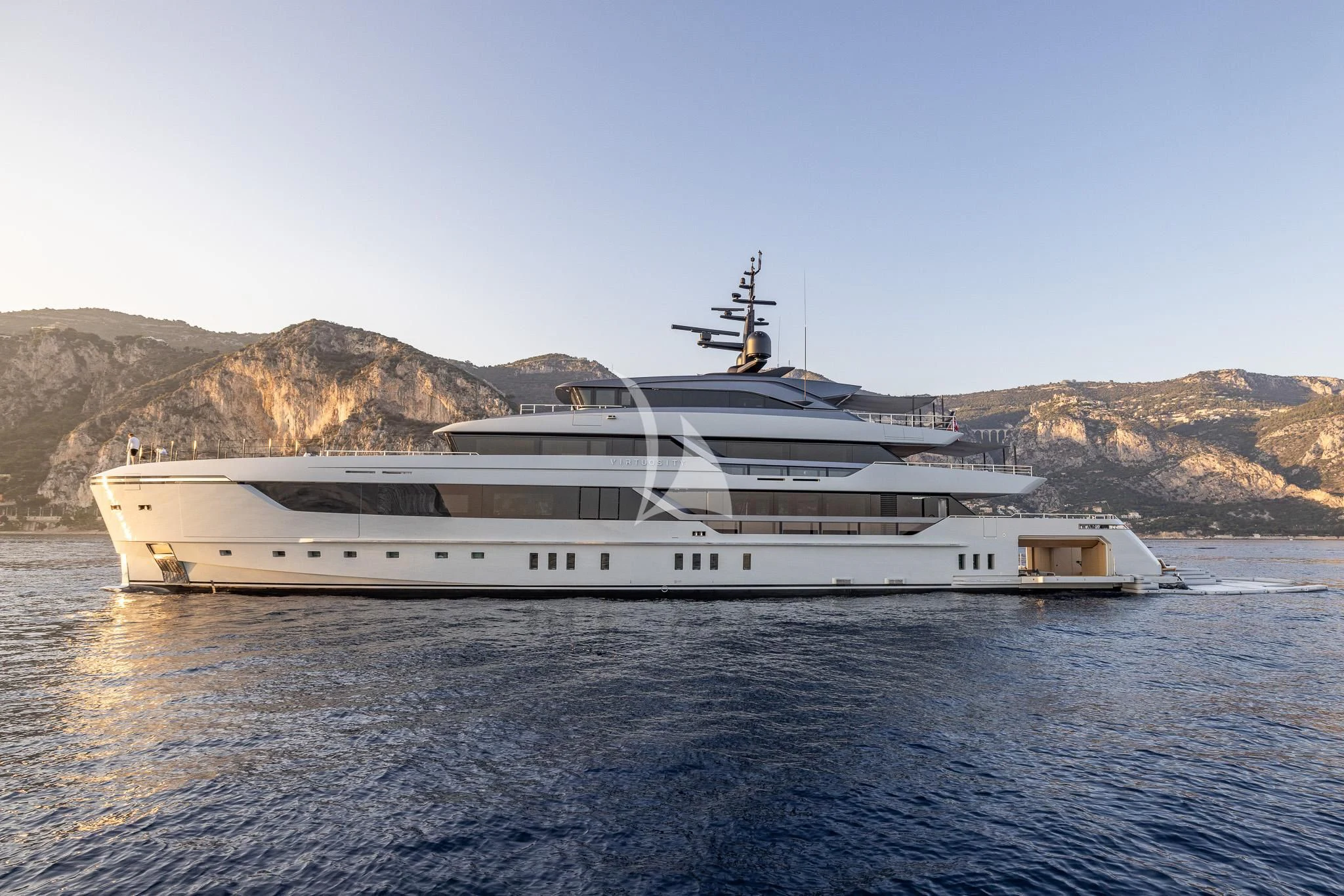 a large white yacht in the water aboard VIRTUOSITY Yacht for Sale