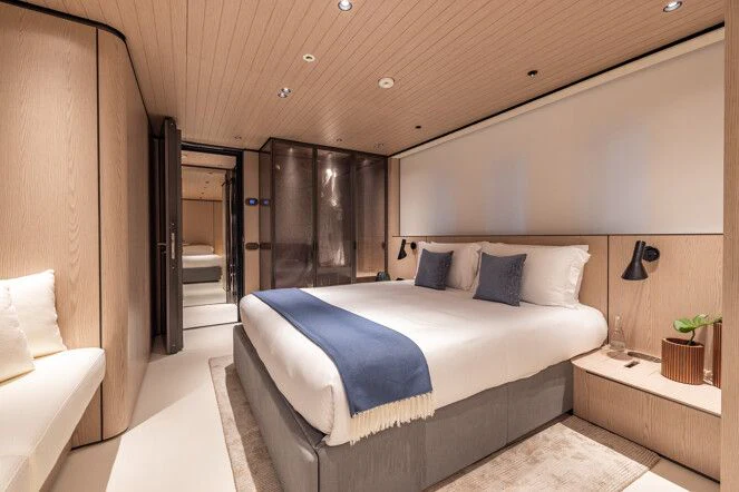 a bed in a room aboard VIRTUOSITY Yacht for Sale