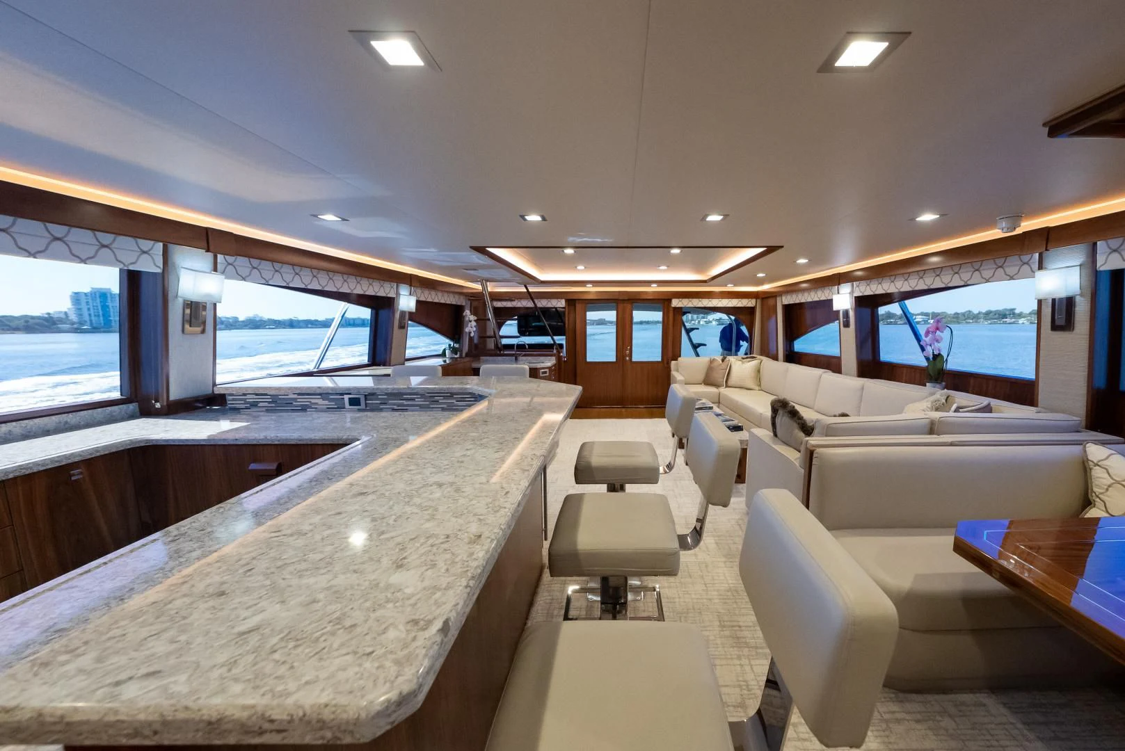 a room with a table and chairs aboard SIR' REEL Yacht for Sale