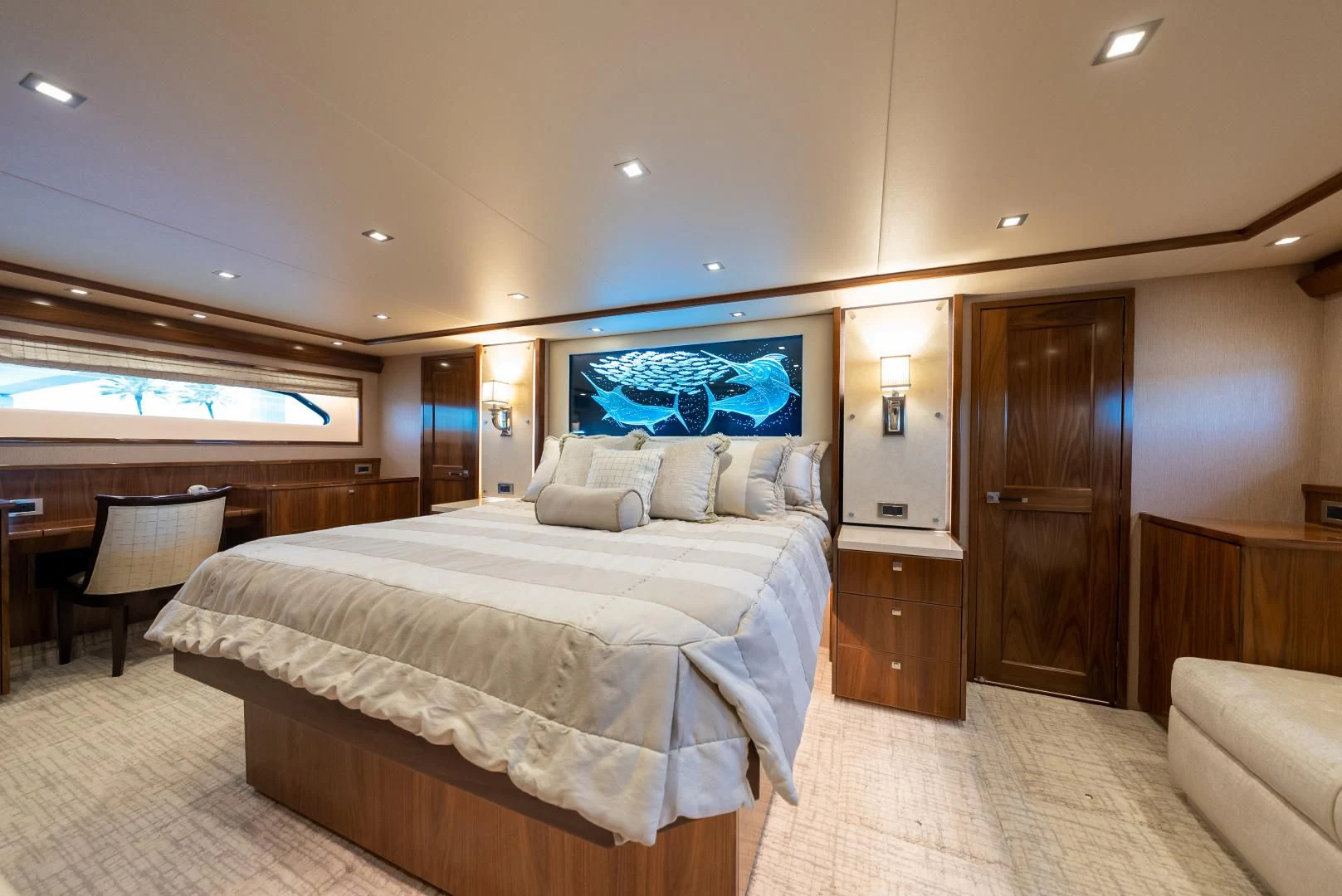 a hotel room with a bed and a chair aboard SIR' REEL Yacht for Sale