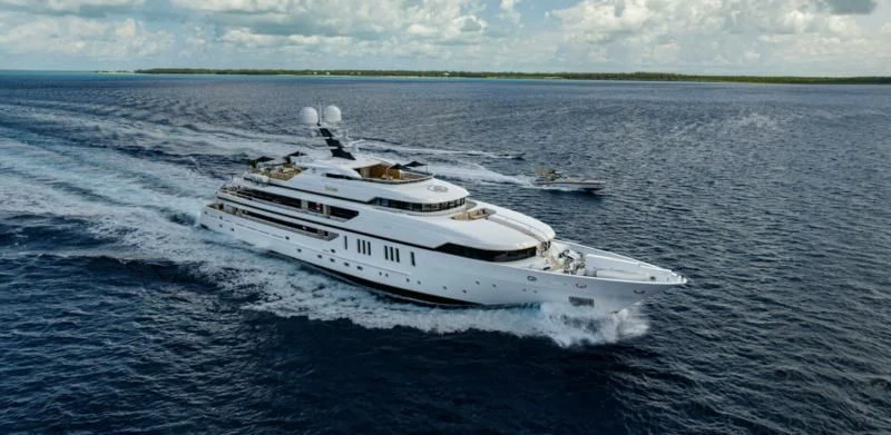 a white yacht in the water aboard SEALION Yacht for Sale