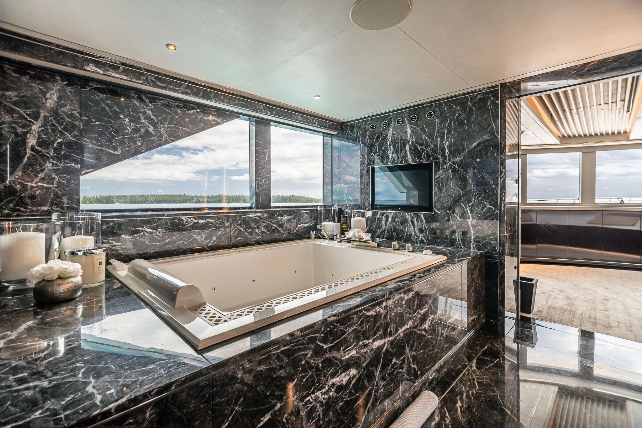 a large bathroom with a large jacuzzi tub aboard SEALION Yacht for Sale