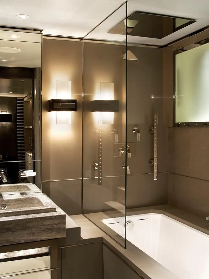 a bathroom with a glass shower aboard SEALION Yacht for Sale
