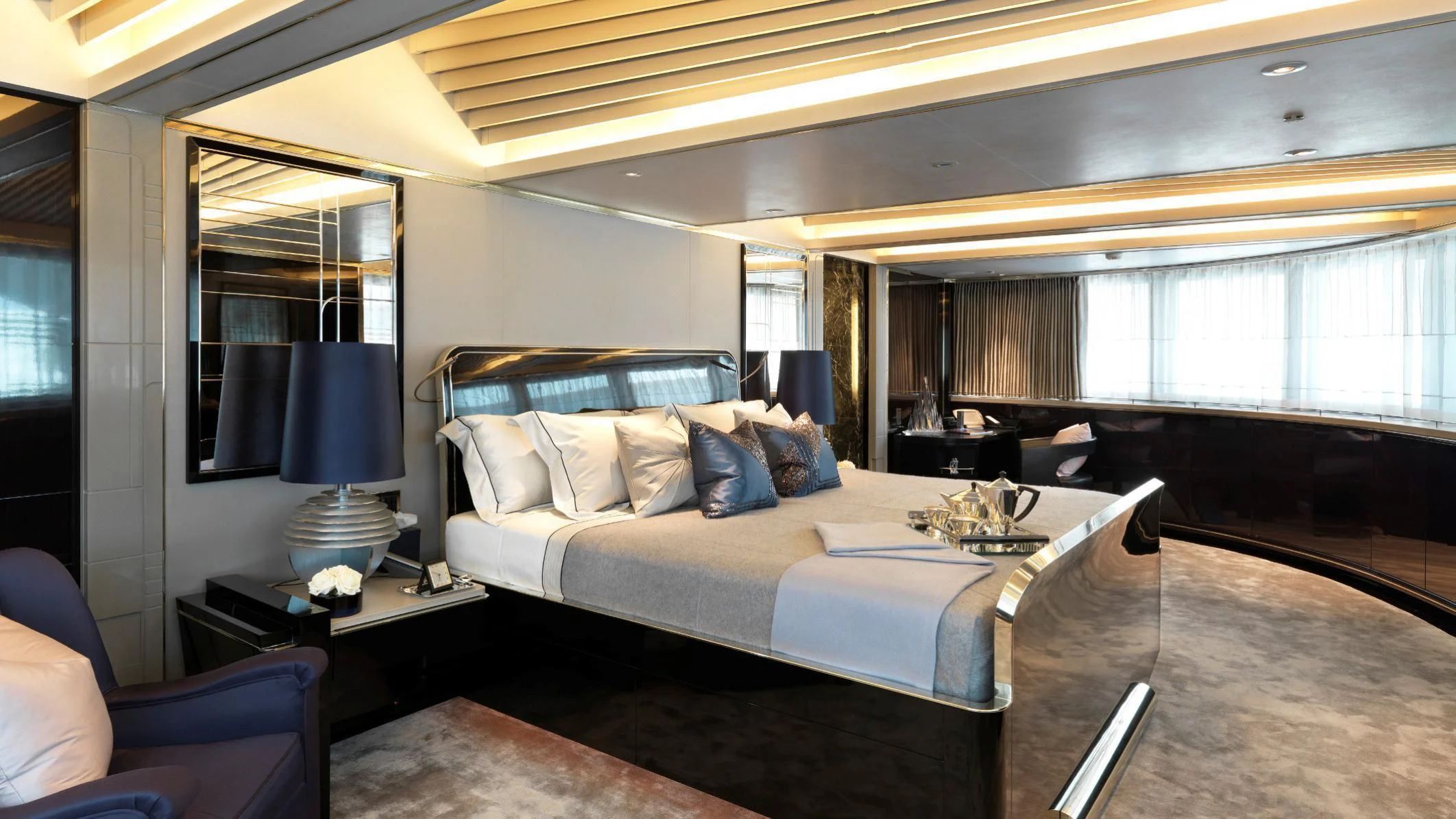 a large bed in a room aboard SEALION Yacht for Sale