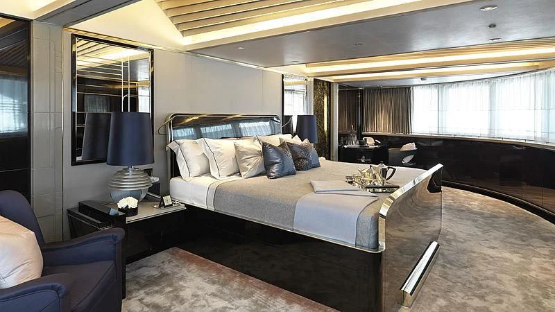 a large bedroom with a large bed aboard SEALION Yacht for Sale