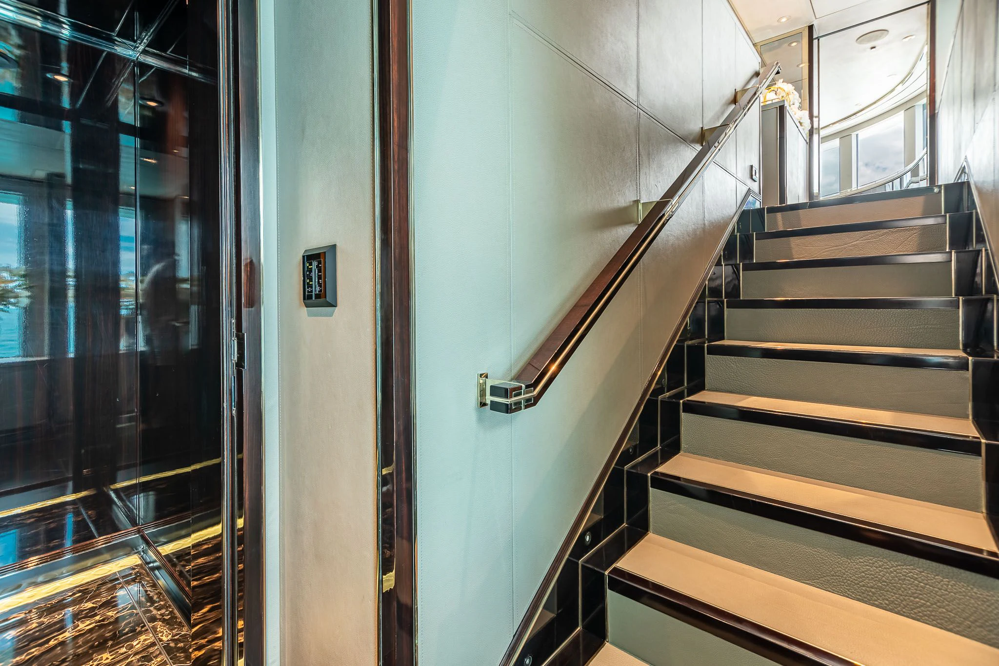 a set of stairs in a building aboard SEALION Yacht for Sale