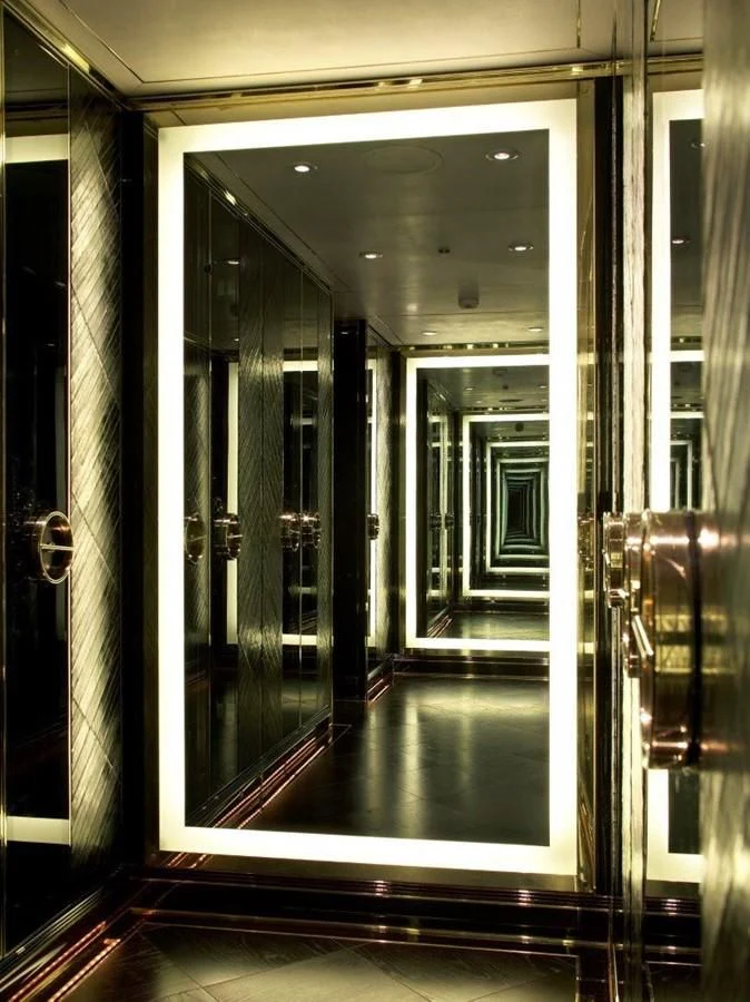 a glass door with glass walls aboard SEALION Yacht for Sale