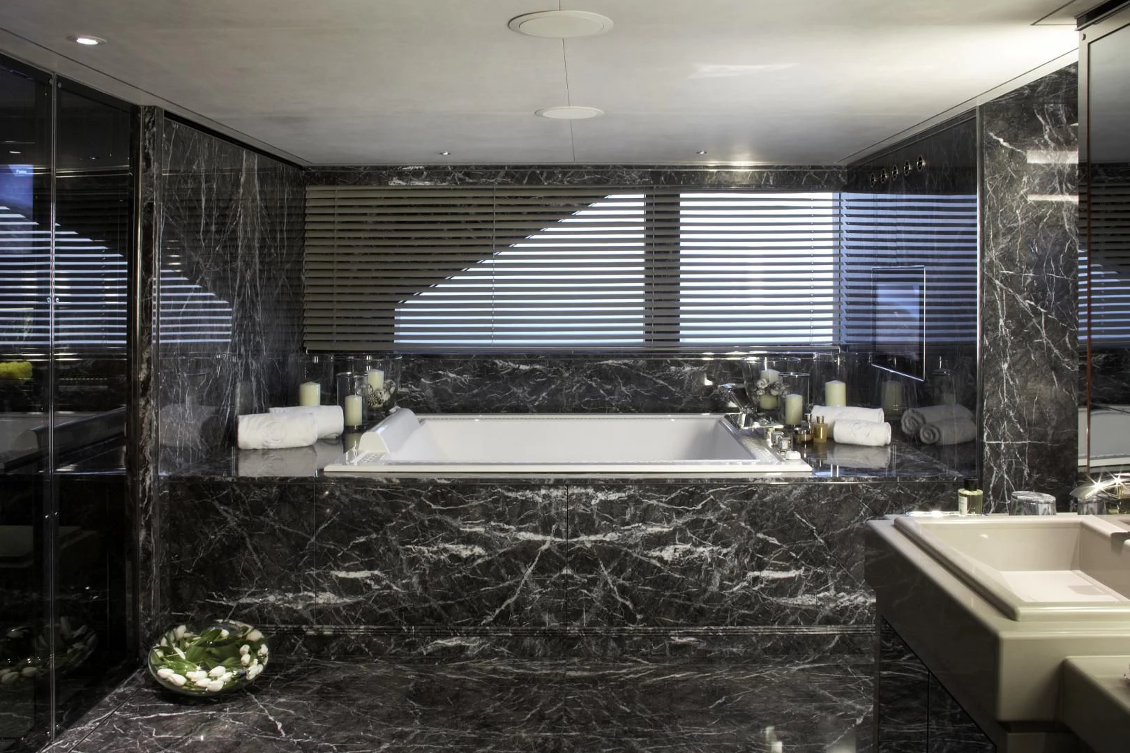 a large bathroom with a large tub aboard SEALION Yacht for Sale