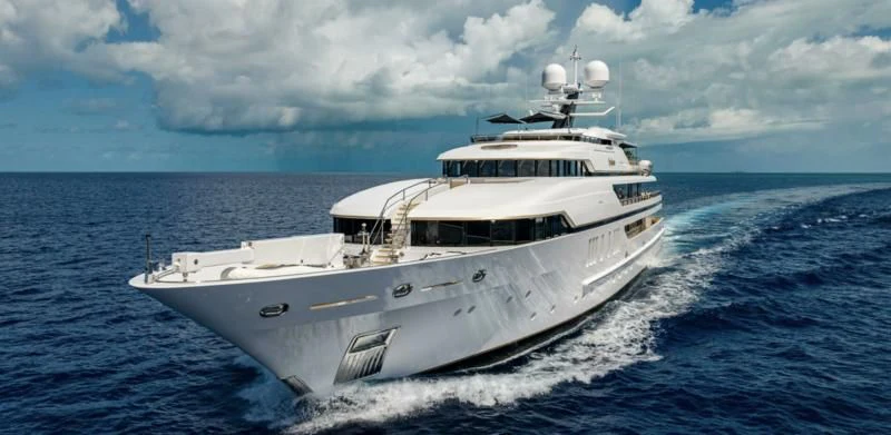 a white yacht on the water aboard SEALION Yacht for Sale