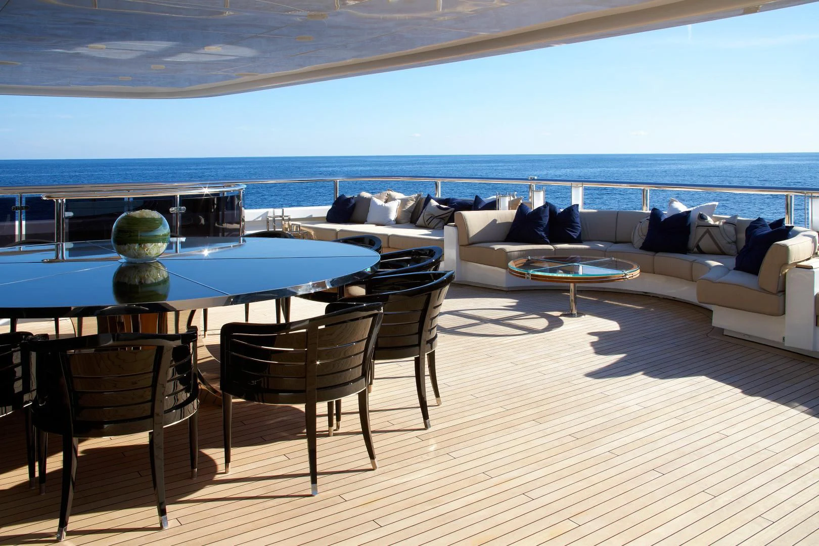 a living room with a couch and table aboard SEALION Yacht for Sale