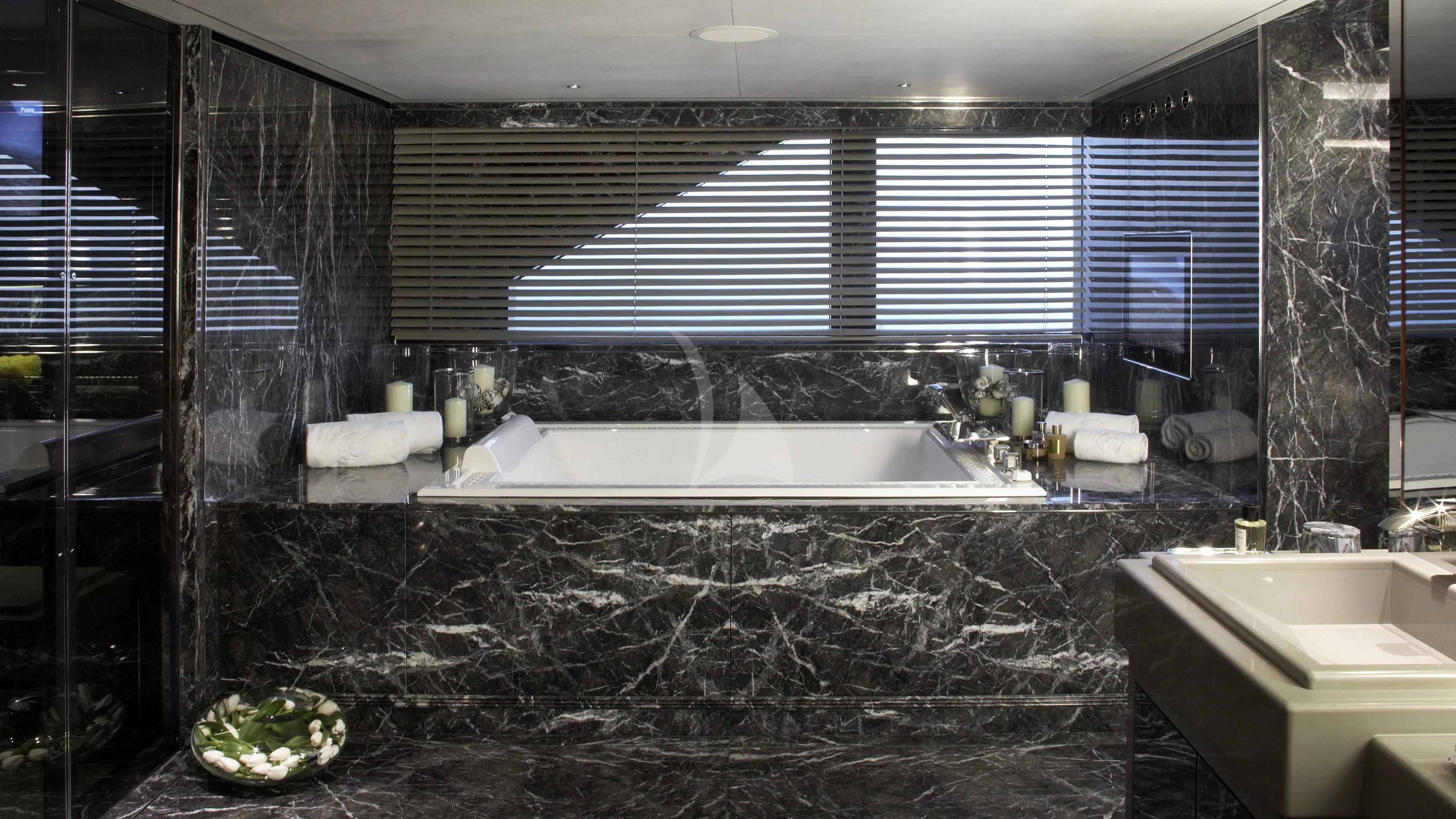 a large bathroom with a large tub aboard SEALION Yacht for Sale