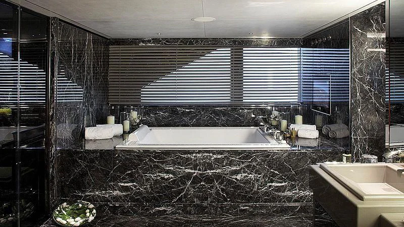 a large bathroom with a large tub aboard SEALION Yacht for Sale