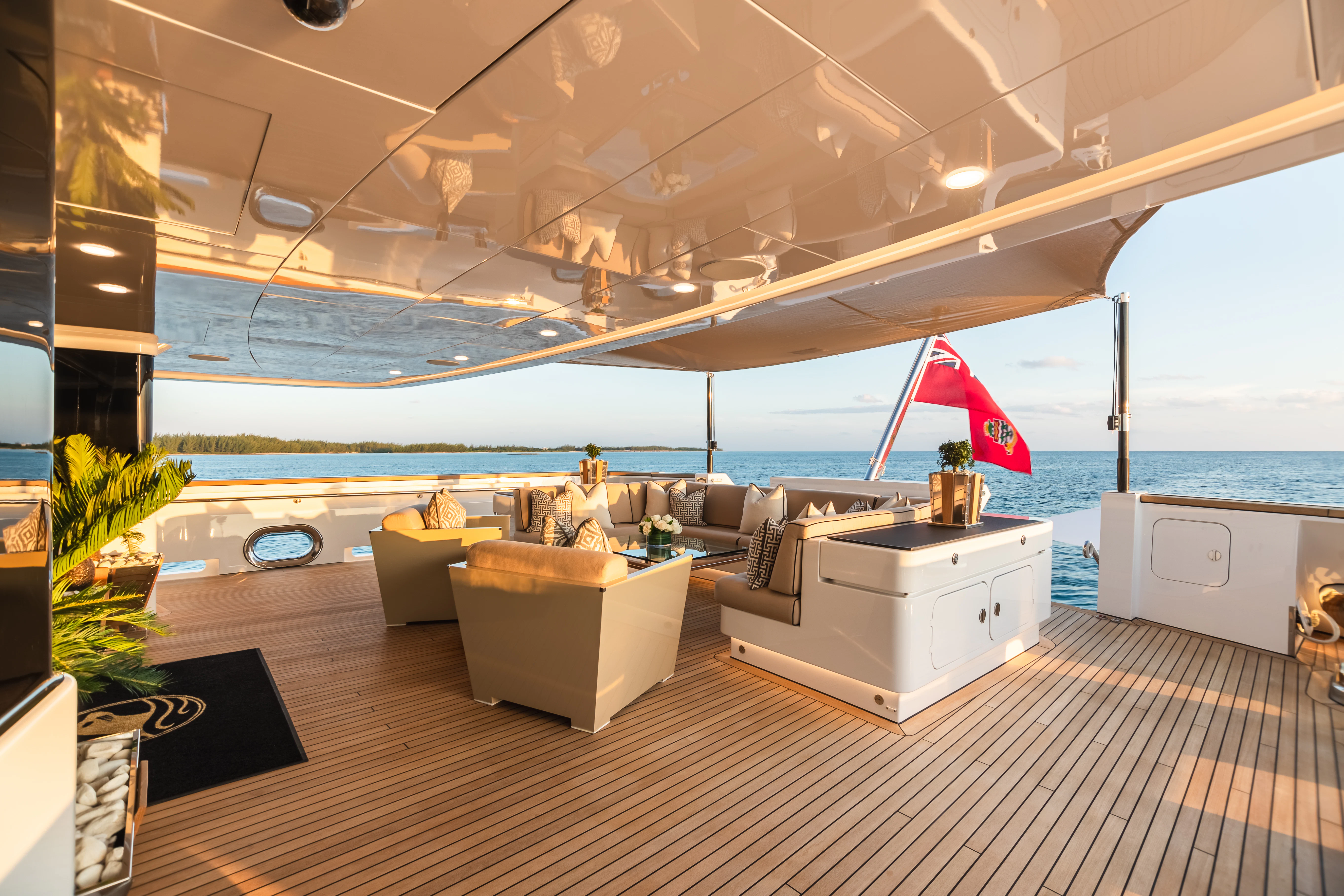 a room with a large open roof and a large body of water aboard SEALION Yacht for Sale
