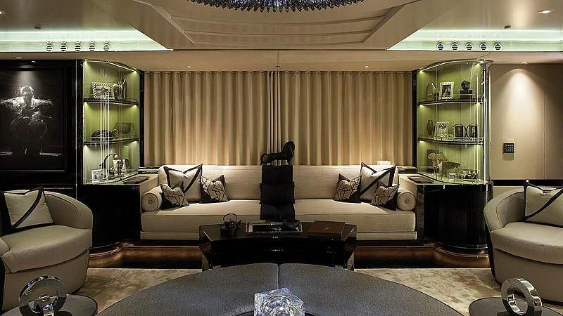 a living room with a large sofa aboard SEALION Yacht for Sale