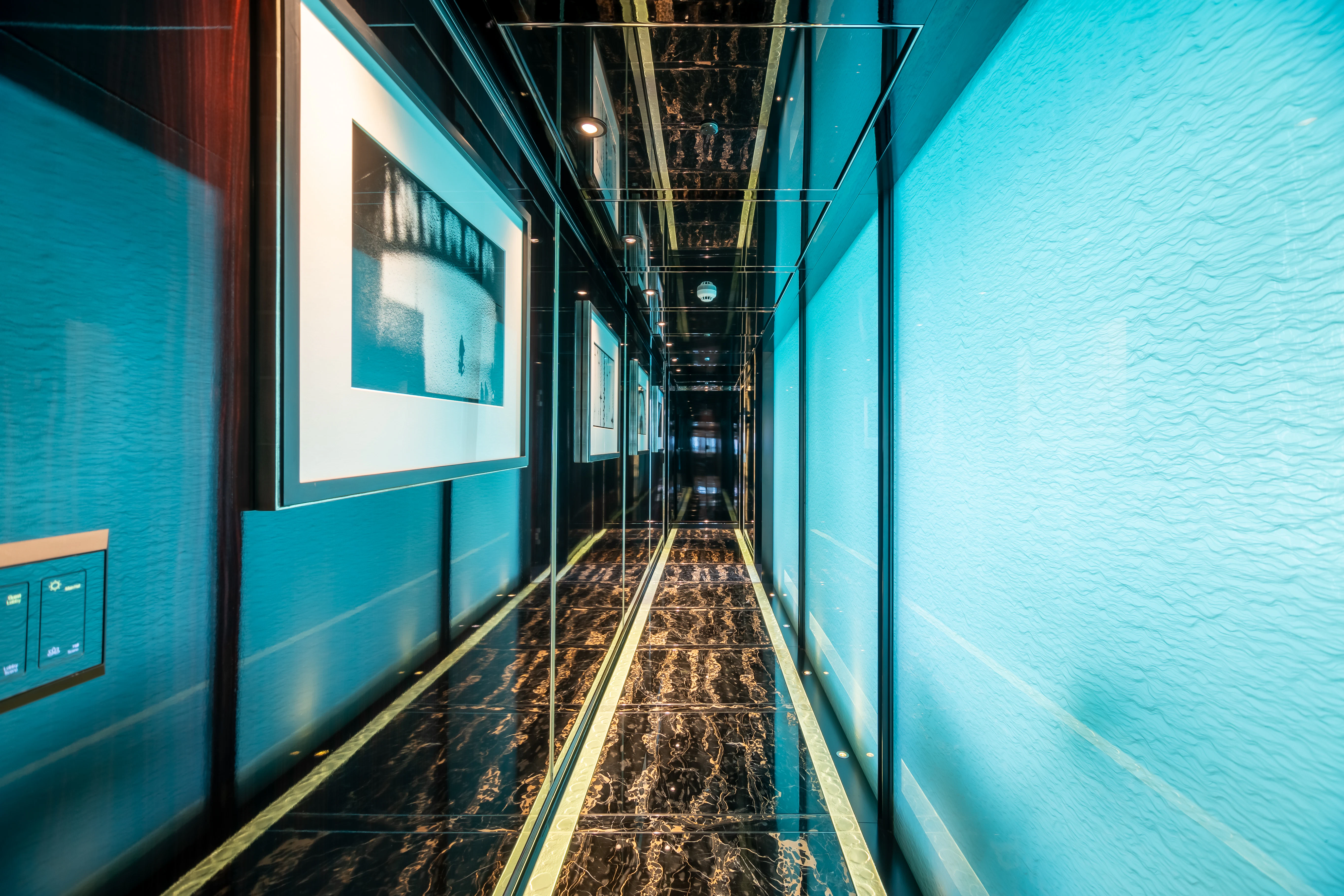 a hallway with a tile floor aboard SEALION Yacht for Sale