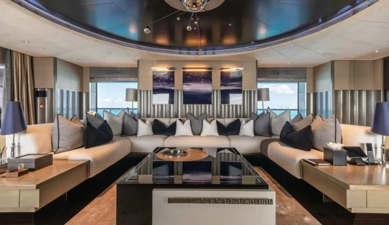 a living room with a large window aboard SEALION Yacht for Sale