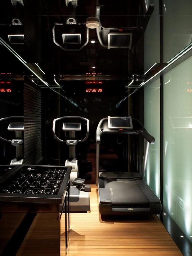 a gym with treadmills aboard SEALION Yacht for Sale