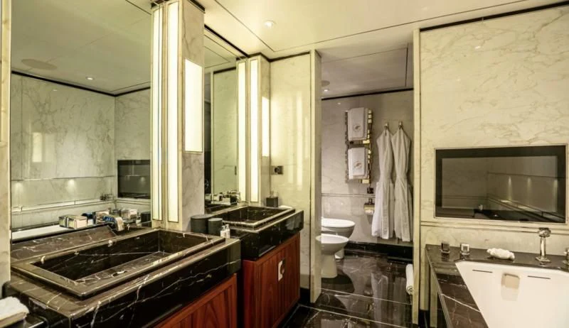 a bathroom with a large mirror aboard SEALION Yacht for Sale