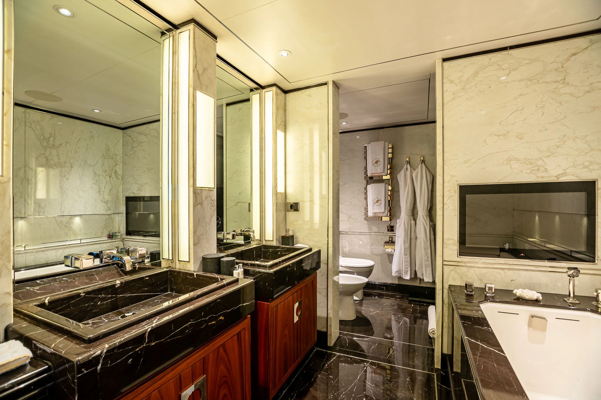 a bathroom with a large mirror aboard SEALION Yacht for Sale