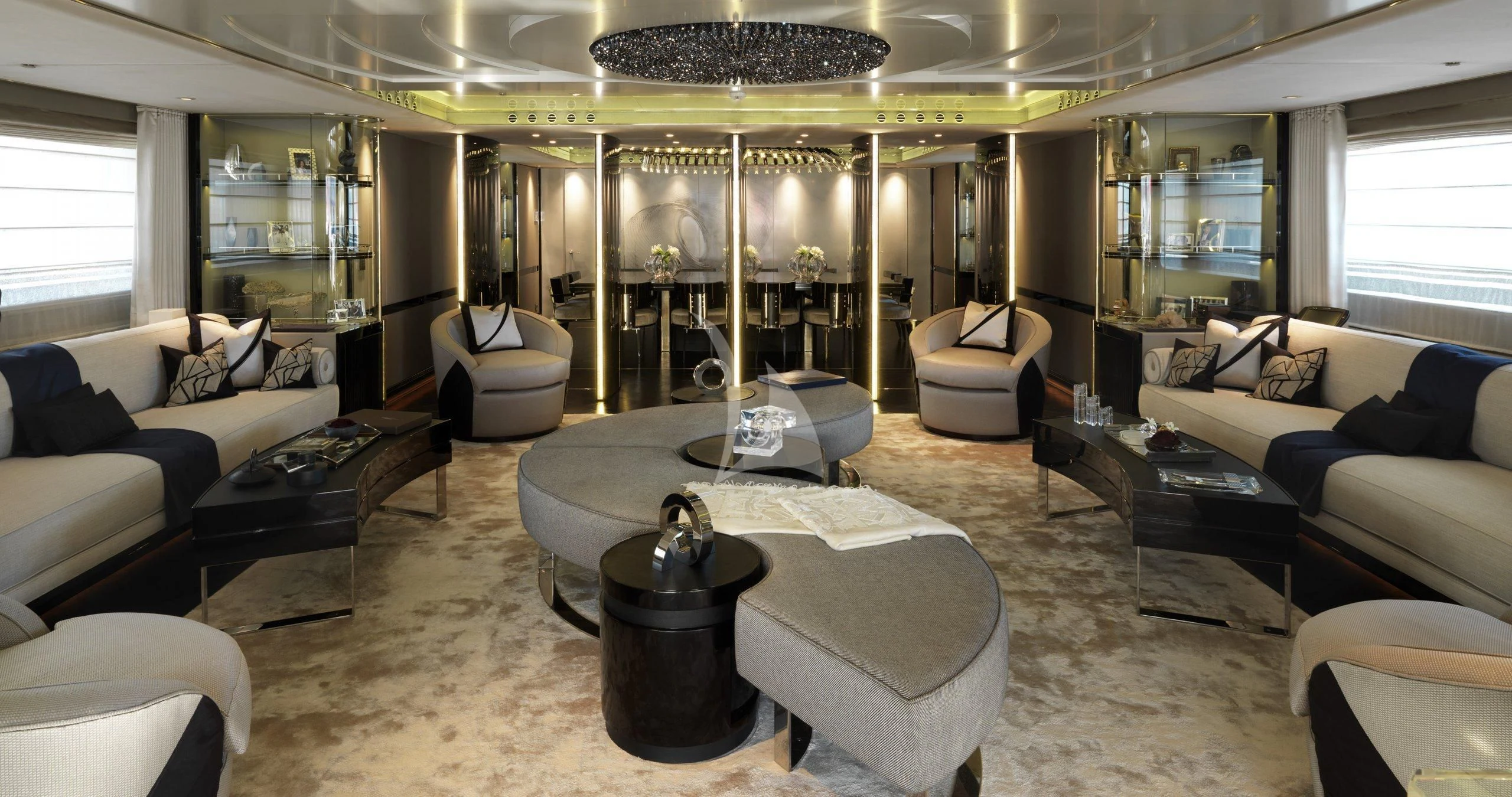 a living room with a large mirror aboard SEALION Yacht for Sale